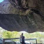 An 80-ton boulder that had hung above visitors at New Hampshire's Polar Caves since the park opened in 1922 collapsed on the final day of the 2026 season, smashing a walkway but injuring no one