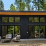 A two-bedroom home in Quebec was built with panels using plastic equivalent to about 200,000 discarded bottles; builders assembled its 1,078 sq ft structural shell in just three days using prefabricated parts