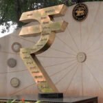 Rupee gains 33 paise as dollar weakens, Sensex and Nifty end higher