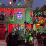 A Boston couple spent months wrapping their ordinary home in hand-carved foam to create a Dracula-style castle for Halloween 2026, and their free display has drawn visitors from other states and 70,000 video views