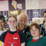 A retired Virginia optometrist opened an ice-cream shop in 2021 to create jobs for people with disabilities; her two stores now employ 35 and she says there is a waiting list to work there