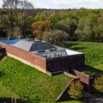 A World War II bunker in England with four-foot-thick walls has been transformed into a £650,000 two-bedroom home with a rooftop terrace and modern interiors
