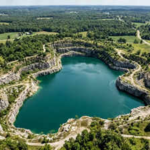 In 2005, two Ohio brothers bought a flooded quarry for $330,000 and spent 15 years improving it; 21 years later, the village abandoned its bid to seize the 72.5-acre site and now has a $206,000 judgment lien against it
