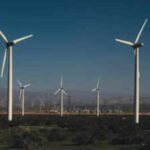 Iowa livestock farmer Dave Johnson hosts four wind turbines that bring in about $30,000 a year, calling the steady lease income the 401(k) he never had while he continues raising cattle and hogs