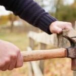 Missouri man was fixing a fence after a months-long property-line dispute when his neighbour allegedly fired a shot; police say video showed a 60-year-old woman pointing a gun at the fence, and court set $500,000 bond