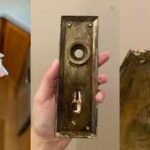 Hidden Treasure: Hidden treasure behind 8 layers of paint: Couple restoring 1913 home finds a mystery ring glued inside a door plate