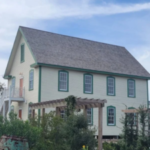 In 1901, Ocracoke opened a two-story island inn; after a $750,000 community purchase, hurricane delays and eight years of restoration, the raised building has passed final inspection as a public cultural center