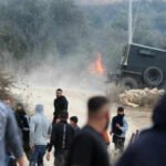Israeli settlers attack Palestinian villages, torch cars and trees during olive harvest
