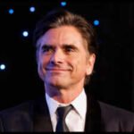 In 1991, John Stamos bought 6 acres in California for USD 430,000 to build his mansion; years later, its asking price fell from USD 13 million to USD 6.4 million by 2026 |