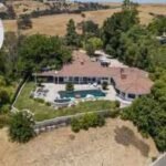 Kim Kardashian once owned a 1.5-acre Hidden Hills ranch split by a road, with a four-stall horse stable on the other side |
