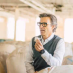 In 2014, a former banker bought a 475,000-square-foot Connecticut wool mill that had lost 85 jobs; 12 years later, Jacob Long's revived factory employs about 50 people and makes fabric for the US military