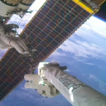 Nasa astronauts Anil Menon and Joshua Kutryk install the seventh solar array on the ISS during the 100th US spacewalk; spend 7 hours upgrading the power supply outside the space station |