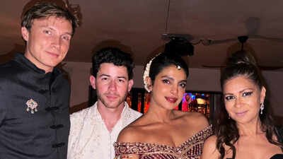 Priyanka Chopra wears embroidered Indian outfit with floral gajra as Nick Jonas matches in cream and white at star-studded Diwali gathering in LA |