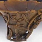 A Sydney shopper bought a carved cup for A$4 at a thrift shop; experts identified it as a centuries-old Chinese rhinoceros-horn cup, and was auctioned for A$75,640 in 2013