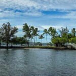 Nearly four years after engineers rated Coconut Island’s only pedestrian bridge in serious condition, an 8,000-pound county excavator helped collapse it; Hawaii now faces up to $22 million to restore access