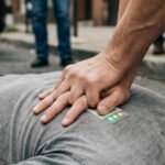 Four University of Washington students built a wallet-sized patch that gives rescuers real-time LED guidance during CPR; the invention has now won the 2026 Collegiate Inventors Competition and a $10,000 prize