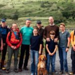Kate Middleton climbed Britain's three highest peaks within 24 hours in June to support a cancer charity; four months later, she shared an unseen photo with William, their three children and mountain rescuers