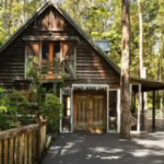 A couple bought a 3.04-hectare Australian estate for A$1.6 million and restored a derelict 1932 woodcutter’s cabin; the two-bedroom retreat now earns up to A$50,000 a year as a holiday rental