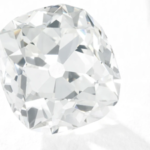 Woman who bought a £10 ring at a London flea market and wore it for decades saw its 26.27-carat diamond sell for £656,750
